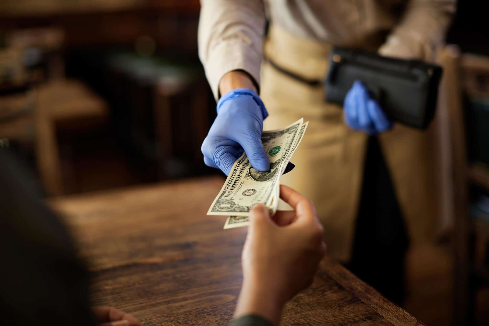 Photo credit - https://www.freepik.com/free-photo/closeup-customer-paying-waitress-cafe_26402007.htm#fromView=search&page=1&position=18&uuid=a7c58c75-9235-4ac2-8b3f-8b4976c05108